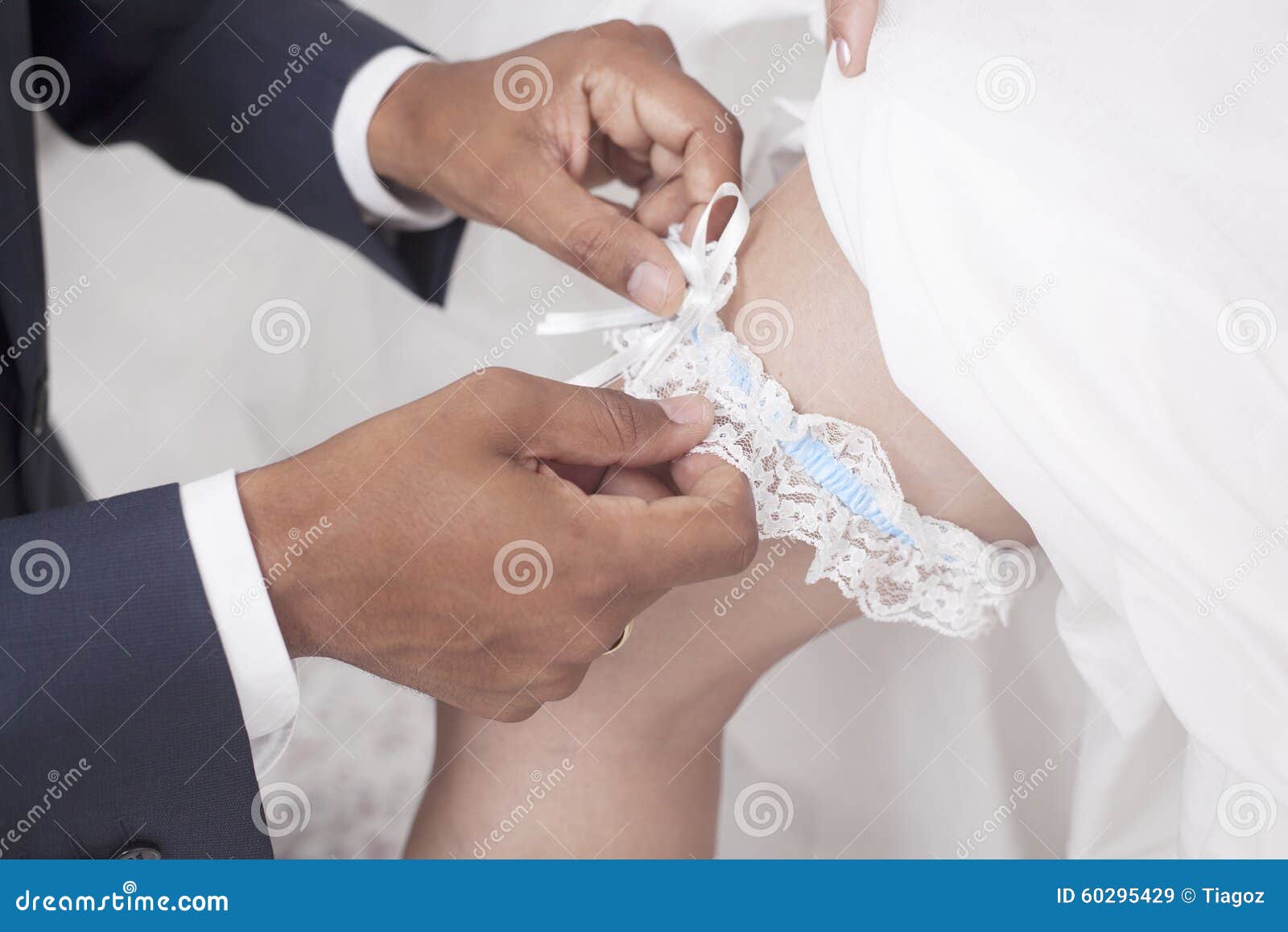 Wedding Tradition Wearing a Garter Stock Image - Image of hair
