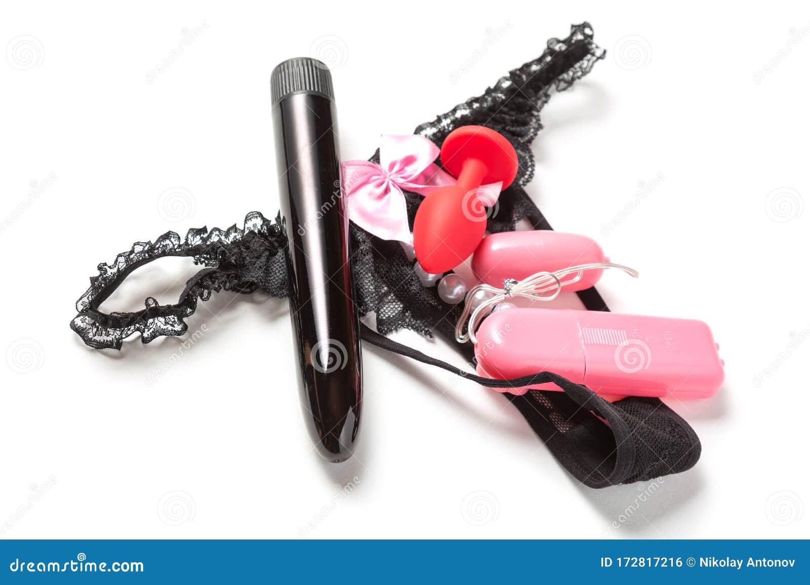 Weibliches Zufriedenheits-Konzept Analer Stecker, Vibratorei Und Schwarzer Dildo Auf Dem Weiblichen Liebes Isoliert Auf Weißem Hi Stockfoto