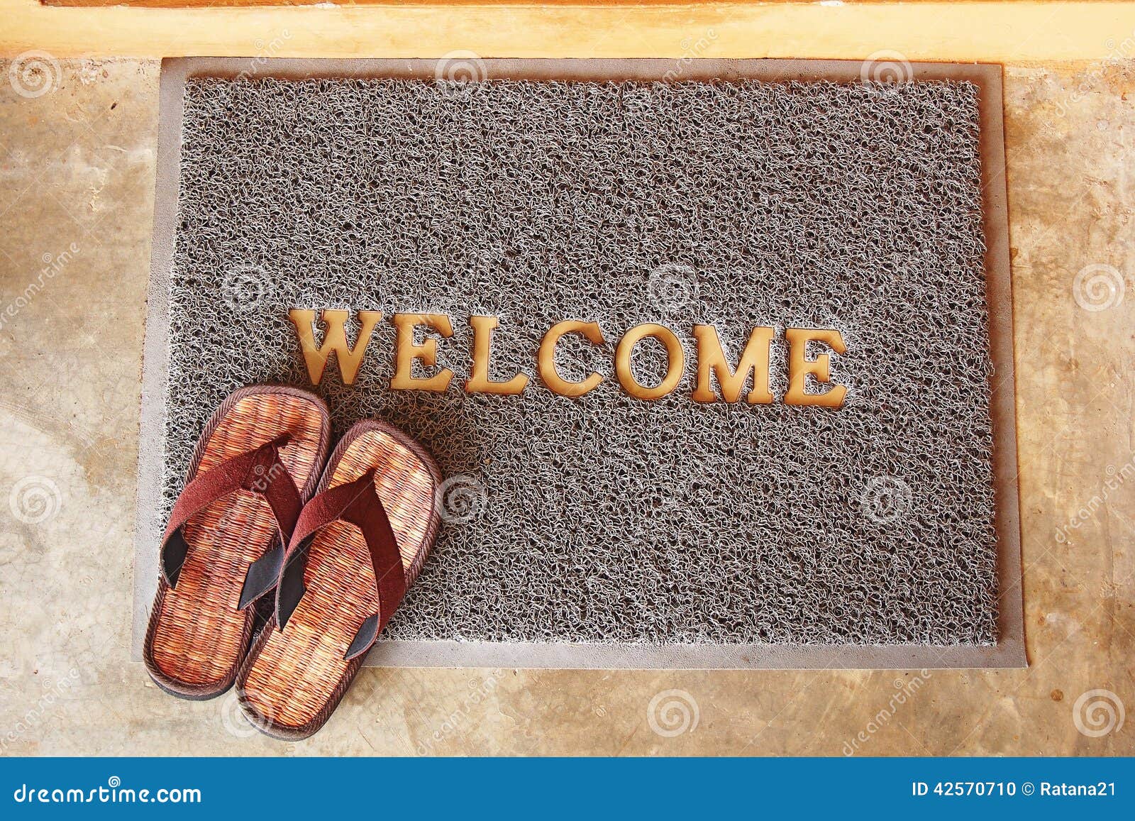 Mat with Brown Sandals Stock Photo Image of grey, flops 42570710