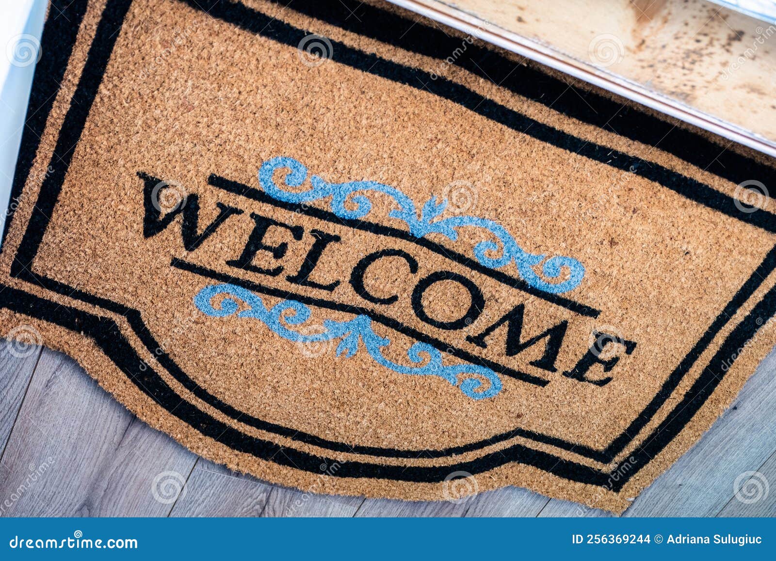 Mat Outside Inviting Front Door of House. Stock Photo Image