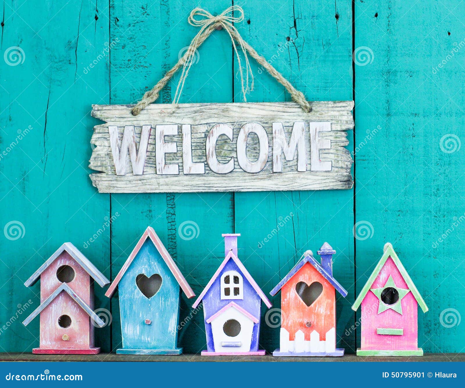 Welcome Sign With Bow By Collection Of Birdhouses Stock 