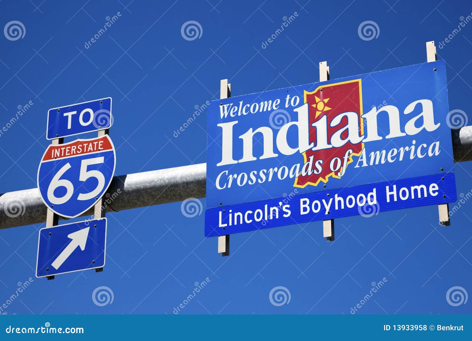 welcome to indiana road sign against blue sky.