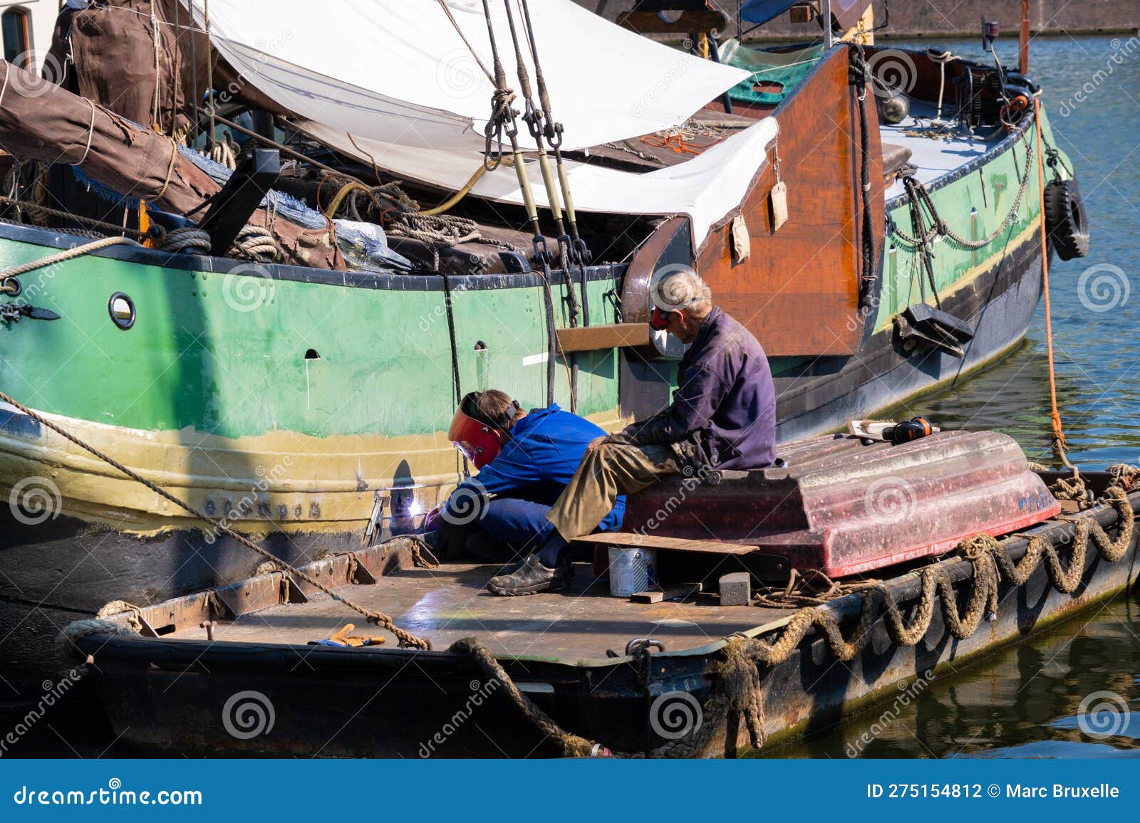 Welder Man Working on a Ship Hull Editorial Photography Image of harbor, welder 275154812