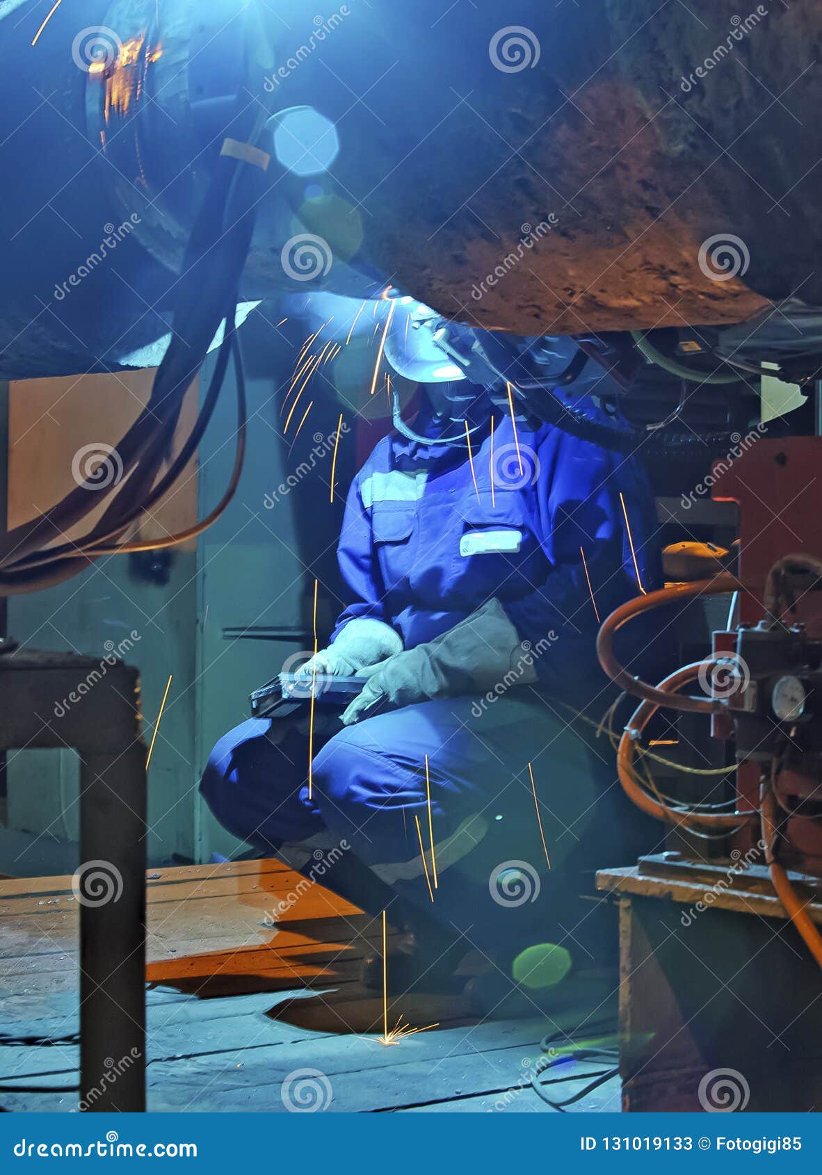 welder resting during a break at work.