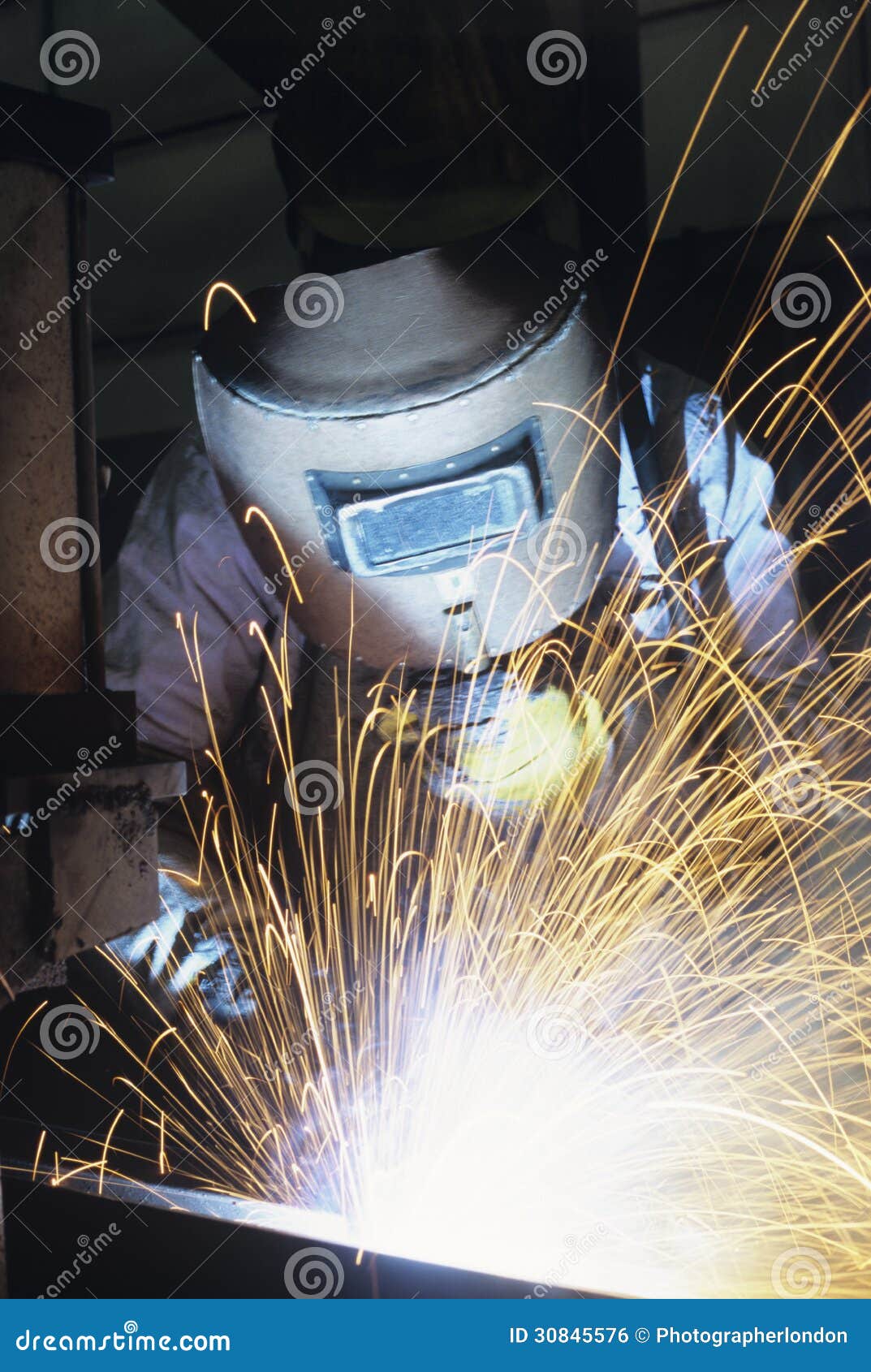Welder Wearing Protective Face Mask Welding At Work Royalty Free Stock