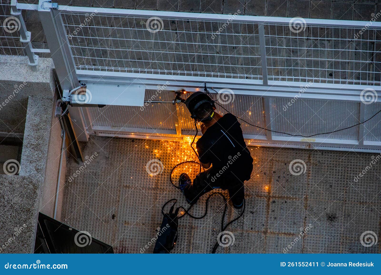 Welder at Work at a Metal Gate Top View Stock Image - Image of object