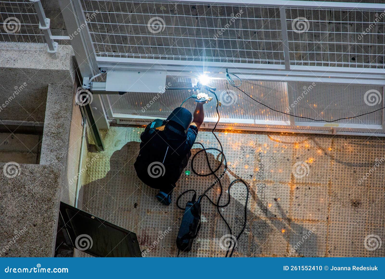 Welder at Work at a Metal Gate Top View Stock Photo - Image of building