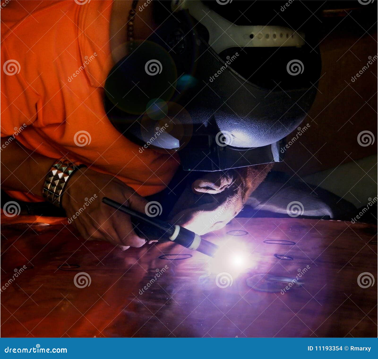 Welding on Copper Plate stock photo. Image of helmet 11193354