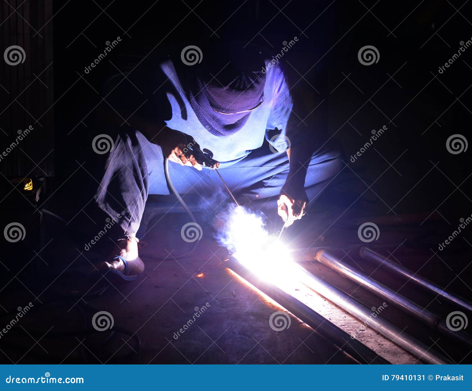 Welding with sparks editorial photo. Image of occupation 79410131