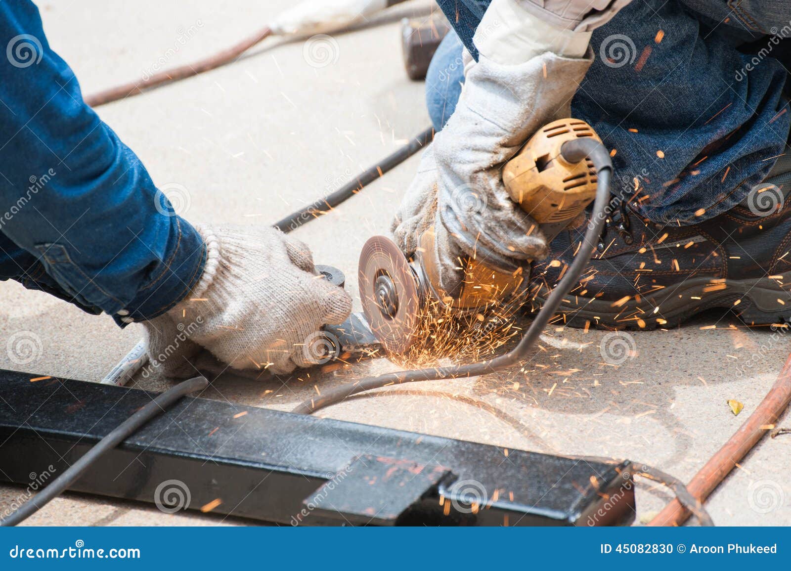 Welding worker in factory. Industrial worker in welding process.