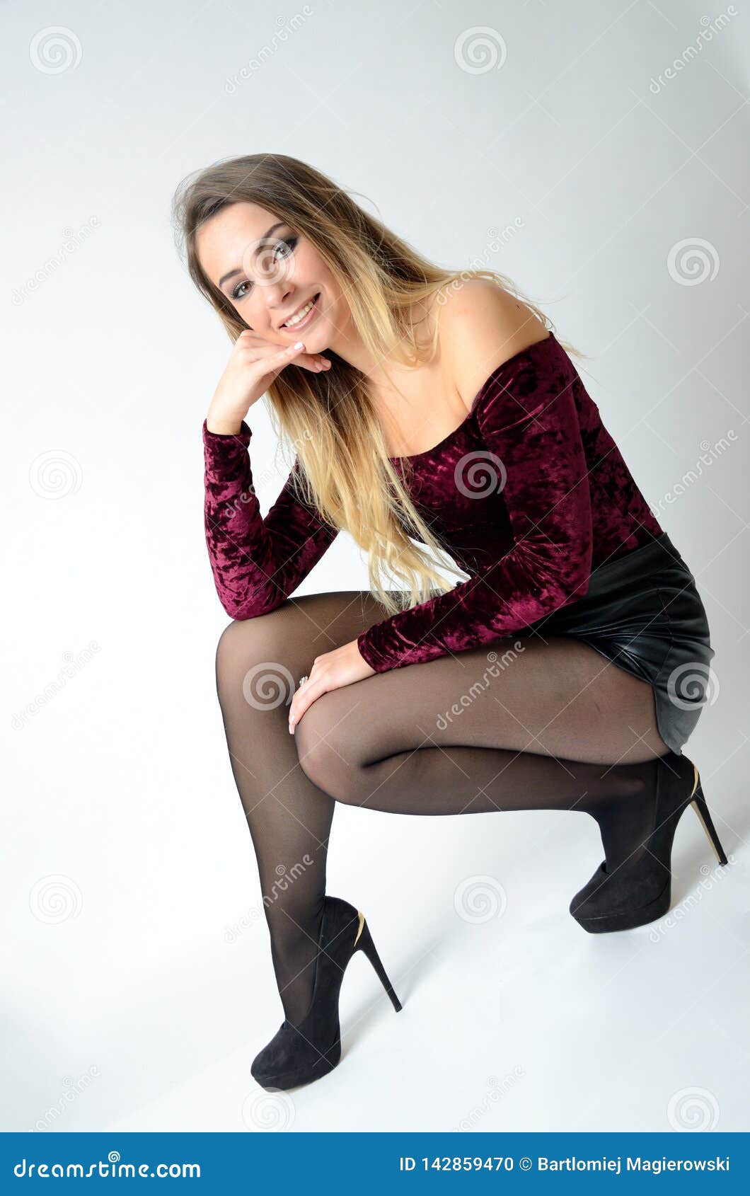 https://thumbs.dreamstime.com/z/well-built-girl-stockings-beautiful-polish-model-maroon-top-black-shorts-high-heels-142859470.jpg