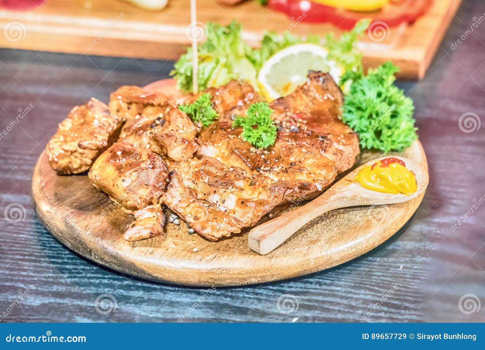 Welldone Grilled Marinated Beef Flank Steak on Wooden Board Stock