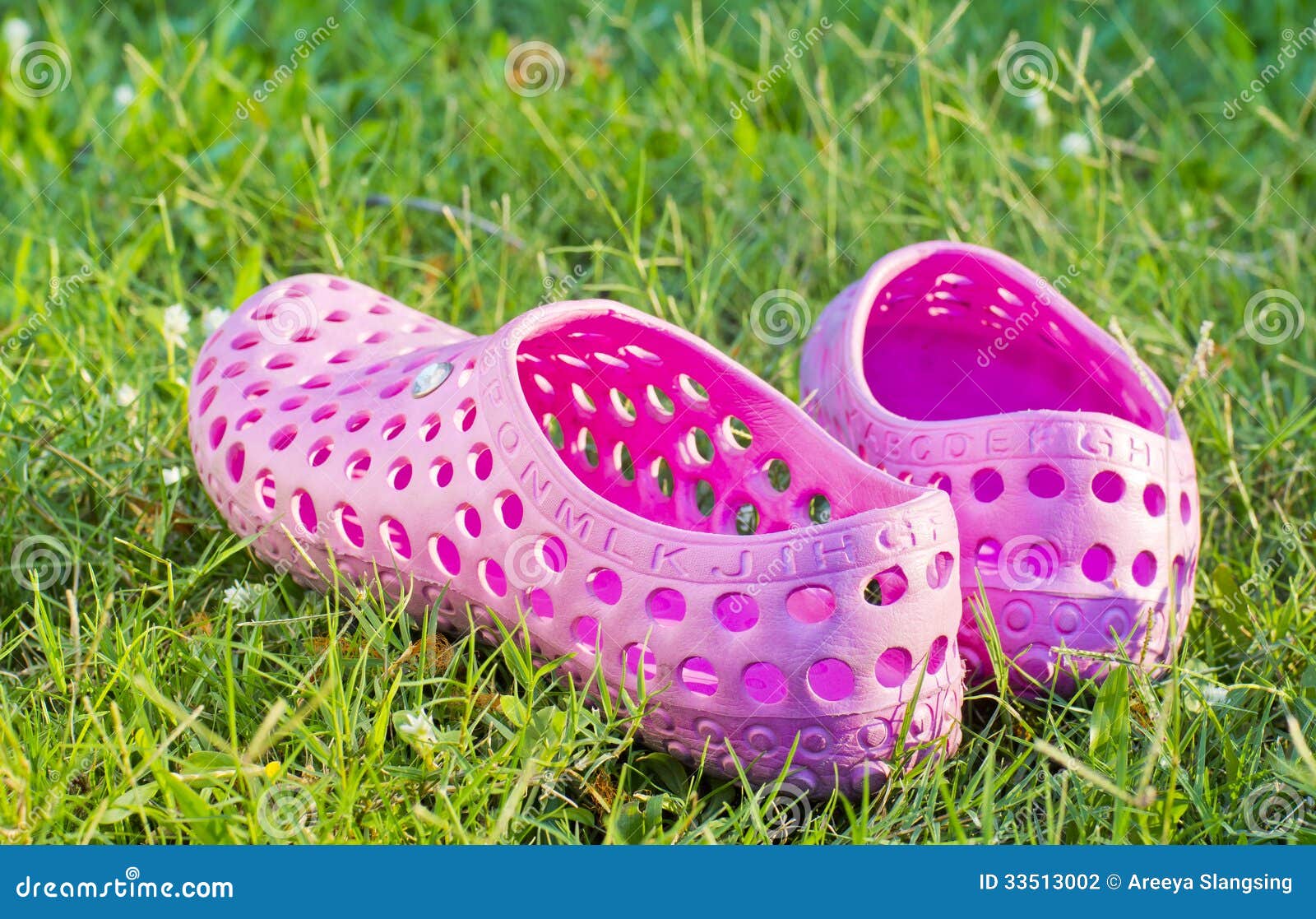 Well Worn Sandals Left on a Lawn Stock Photo - Image of lawn, worn ...