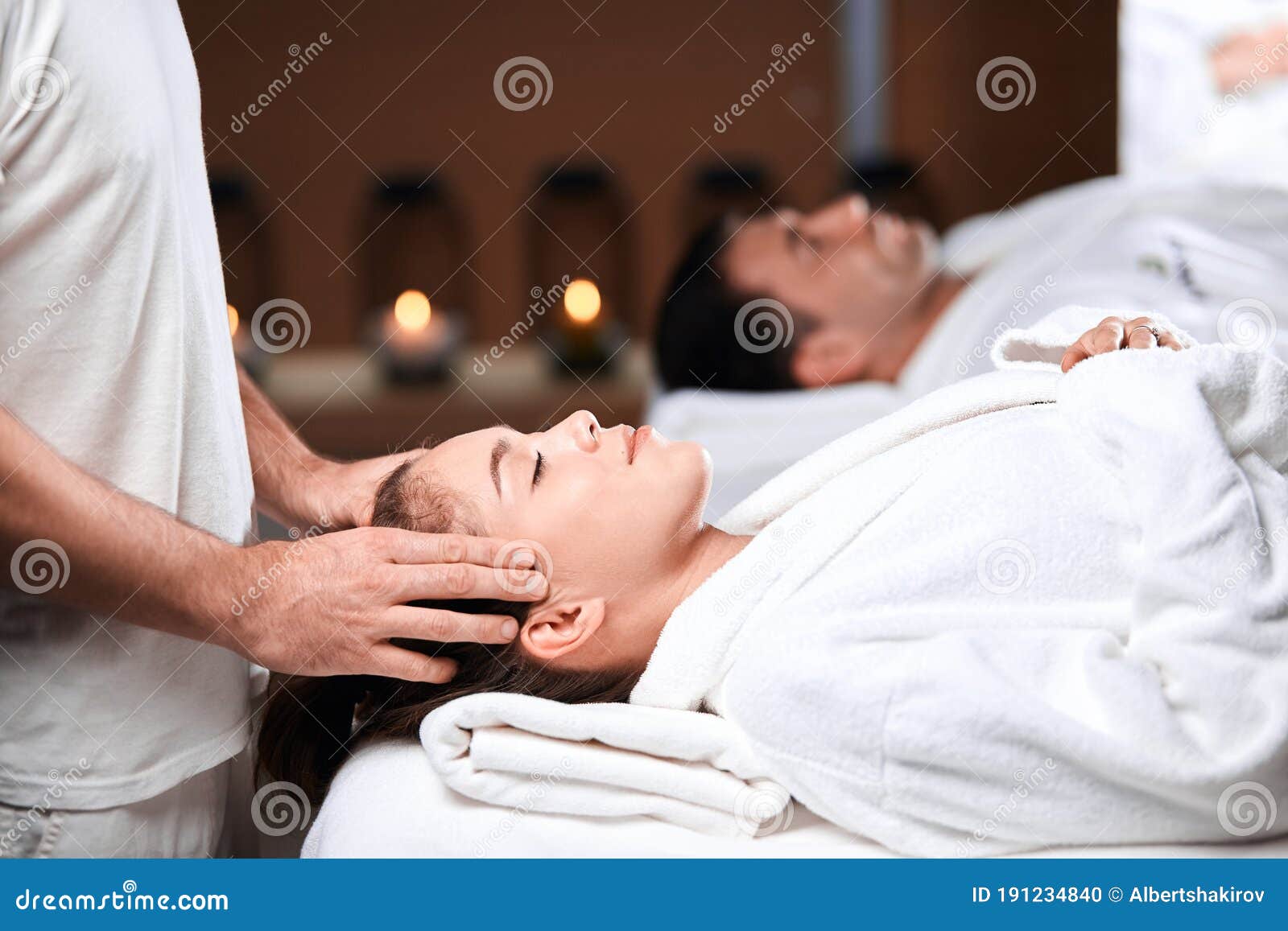 Beautiful Young Woman Receiving Massage On Head And Shoulders Zone In