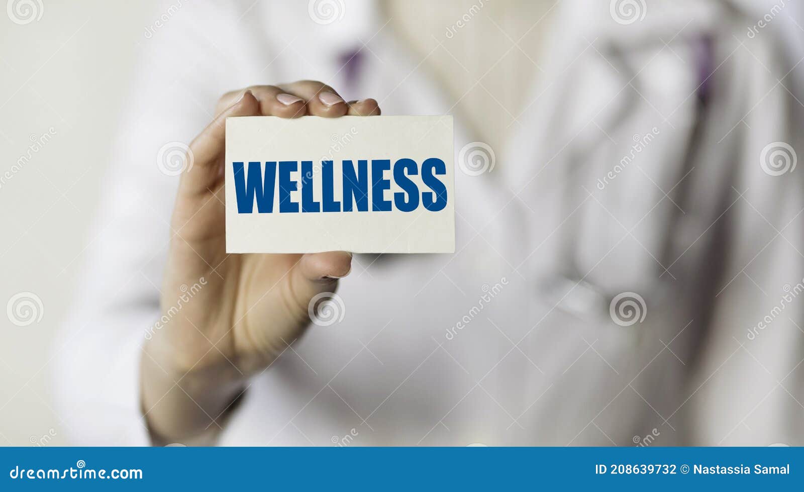 WELLNESS. Card with Text in Hand Medical Doctor Stock Photo - Image of doctor, wellbeing: 208639732