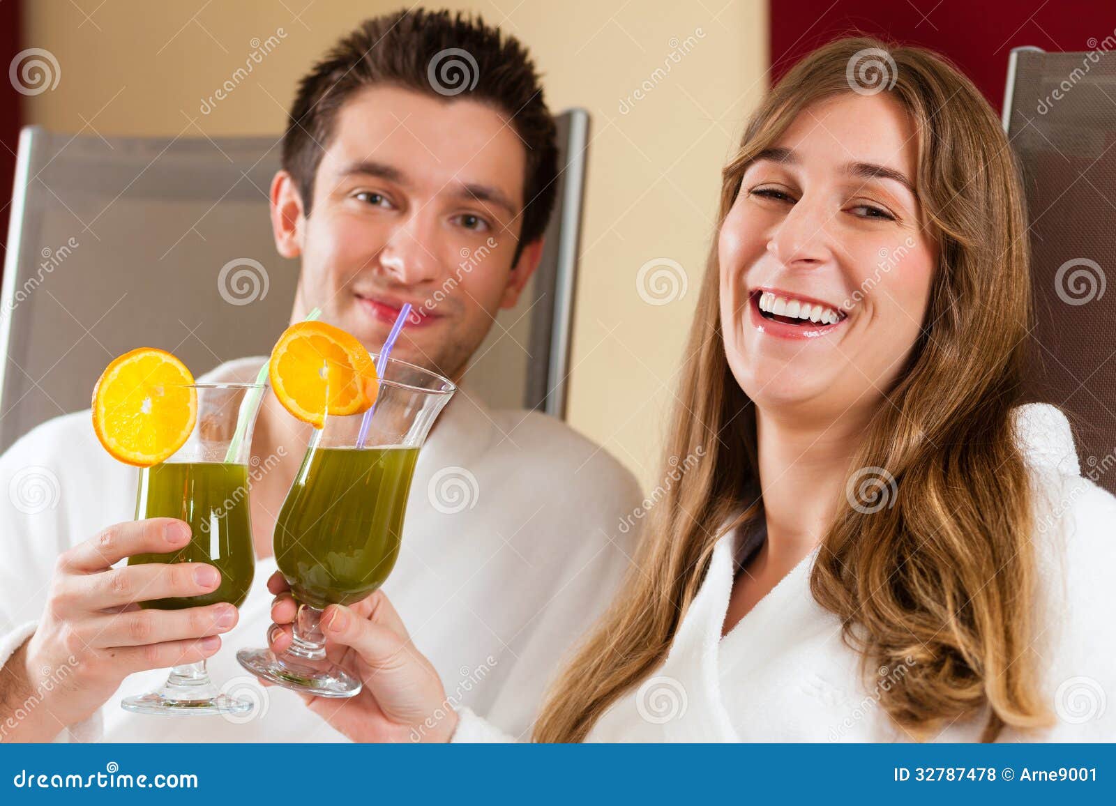 wellness - couple with chlorophyll-shake in spa