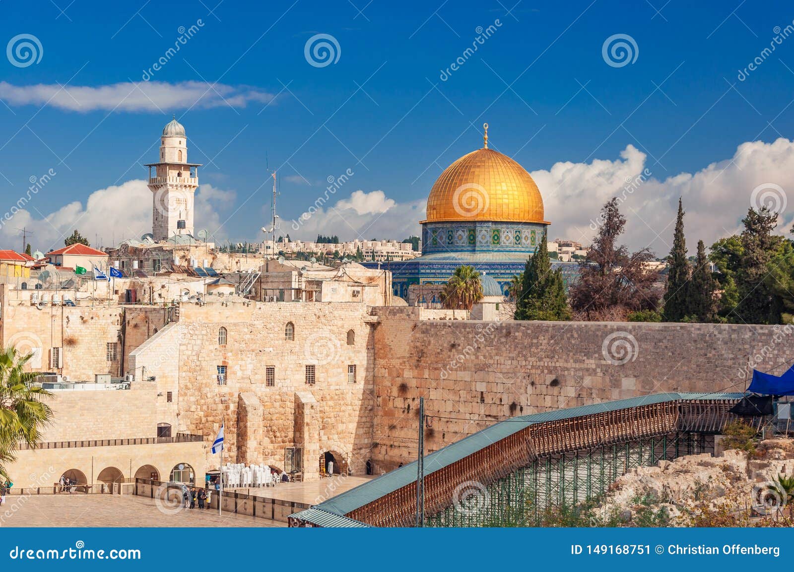 western wall with the iconic dome of the rock above