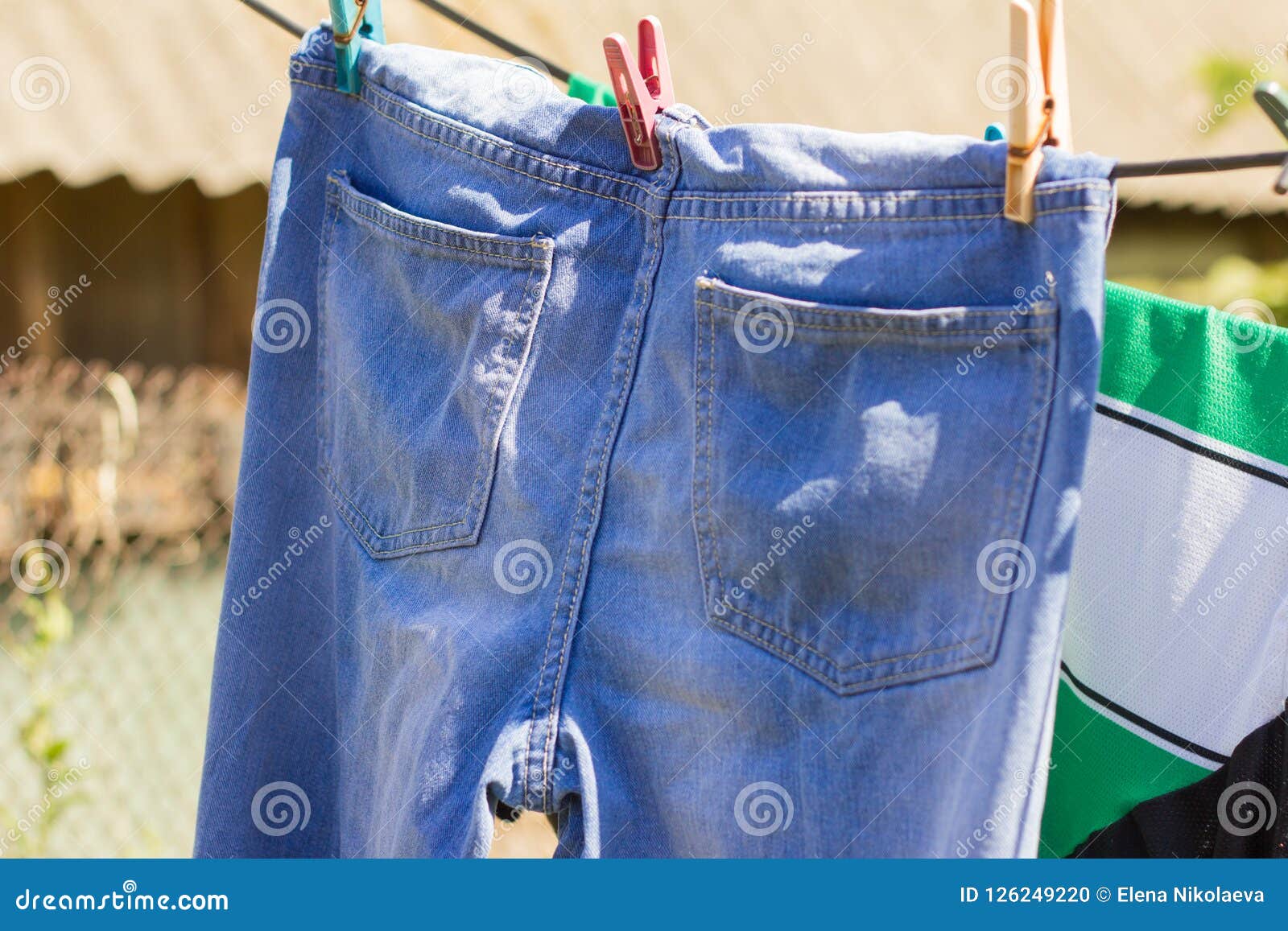 Wet Blue Jeans Hanging on a Rope Stock Photo Image of casual, jean