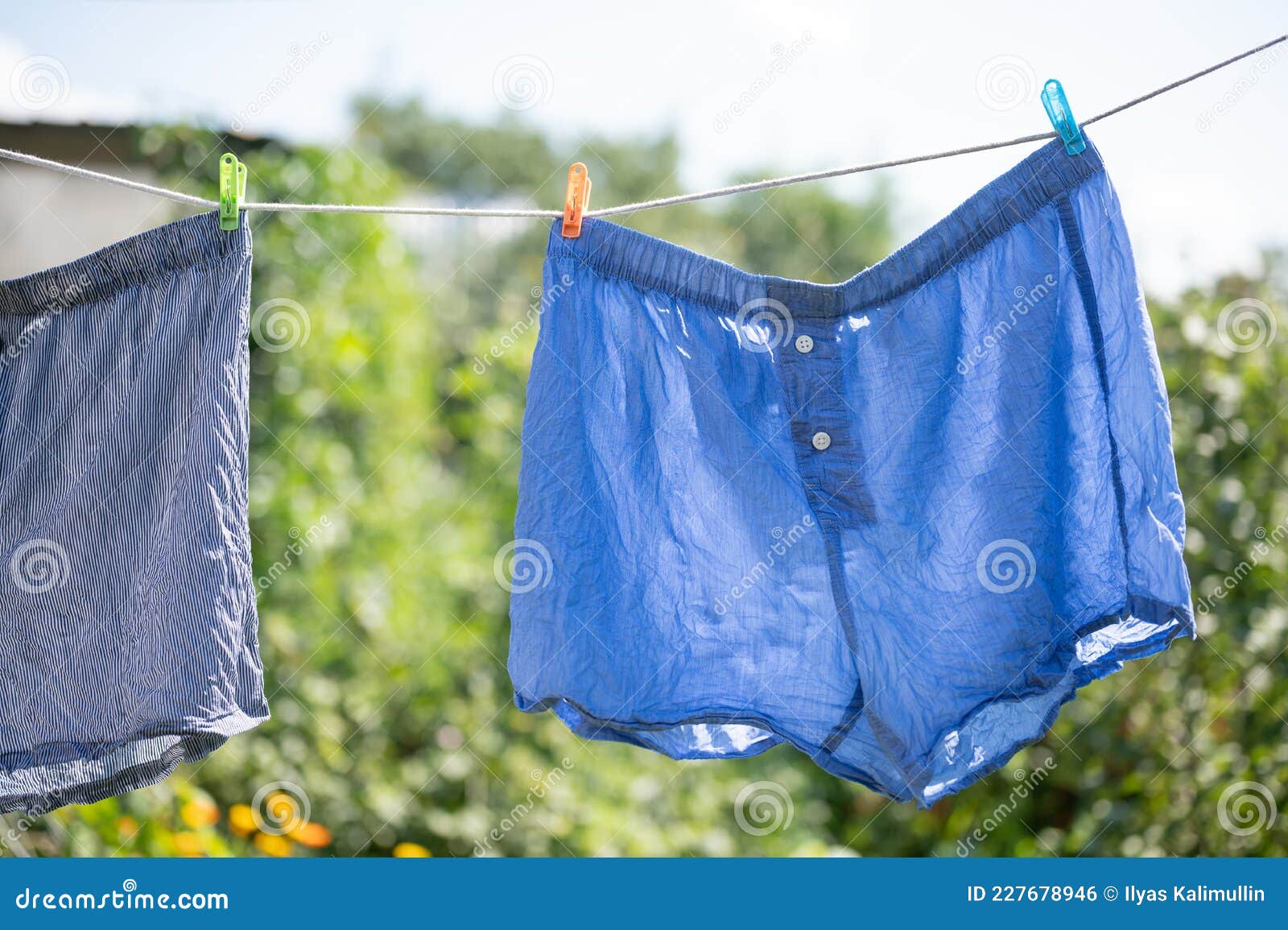 Wet Blue Underpants Drying on the Rope Stock Photo - Image of clean, rope:  227678946
