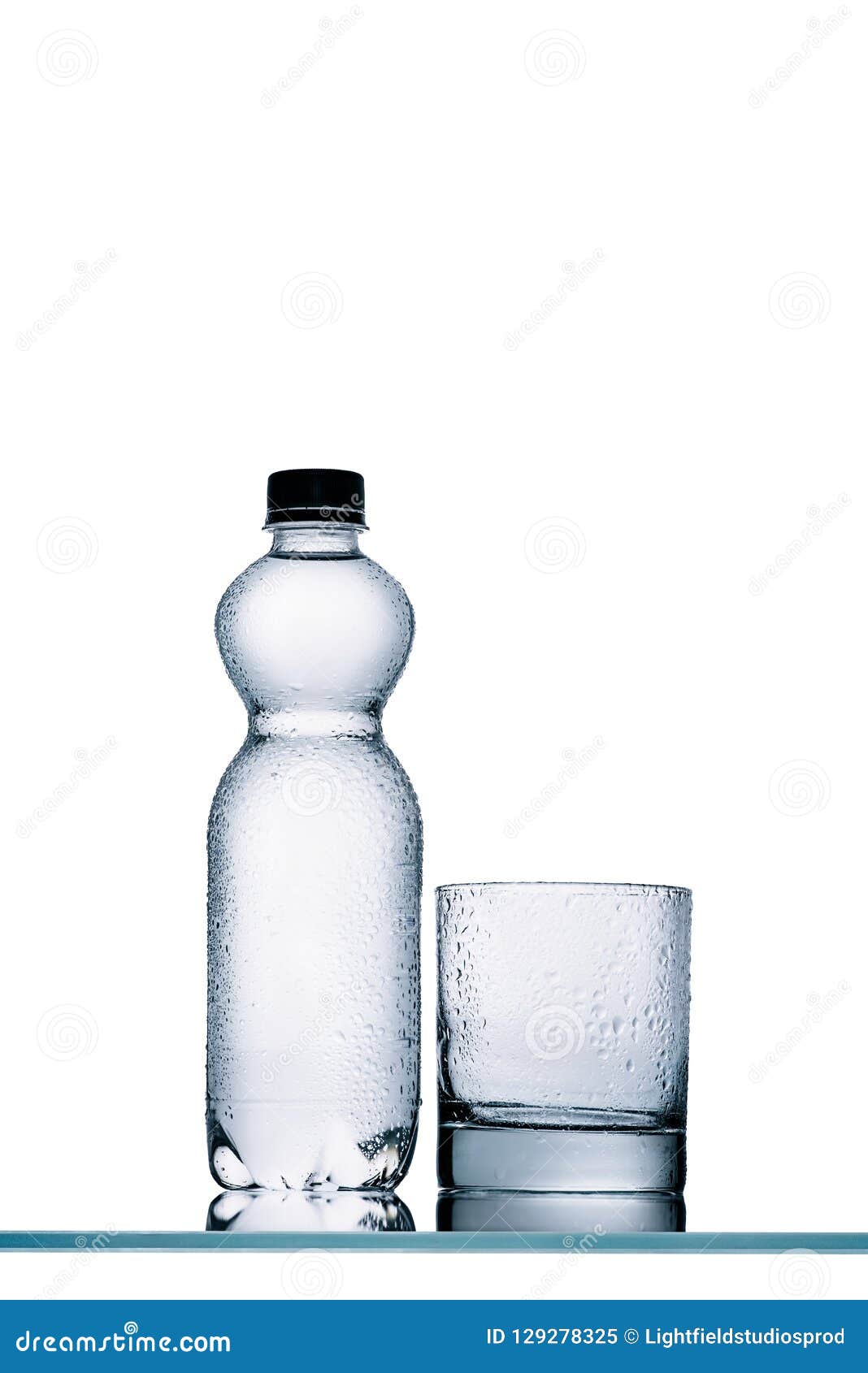 Wet Full Plastic Bottle of Water and Empty Glass Stock Image Image of