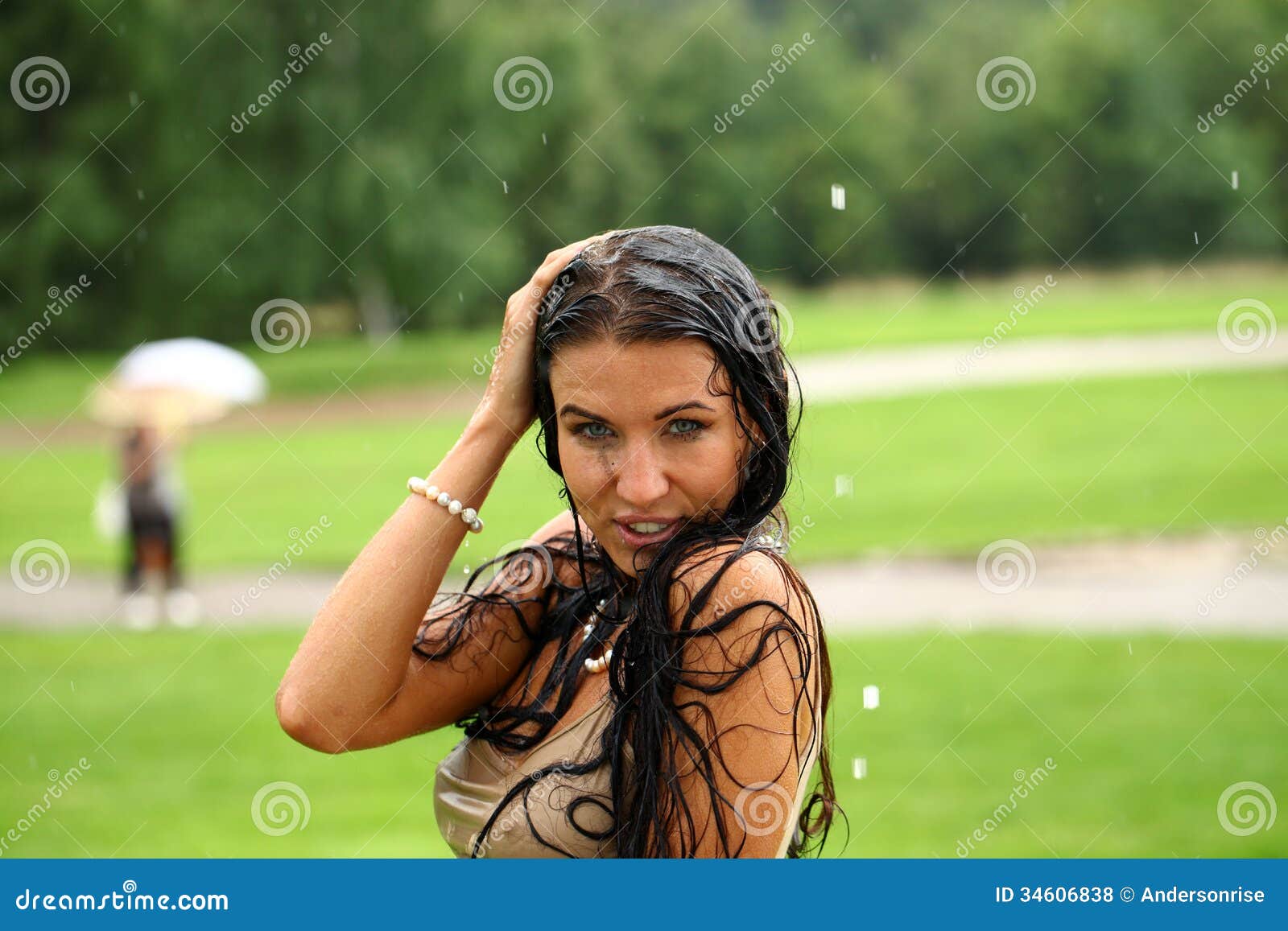 Wet Happy Woman Walking In The Rain Royalty Free Stock