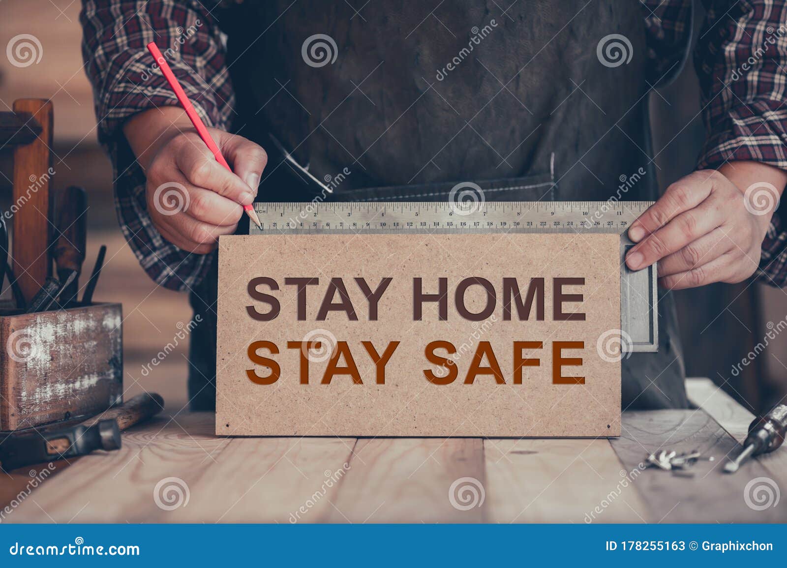 wfh: carpenter working from home. stay home stay safe woodwork concept. social distancing