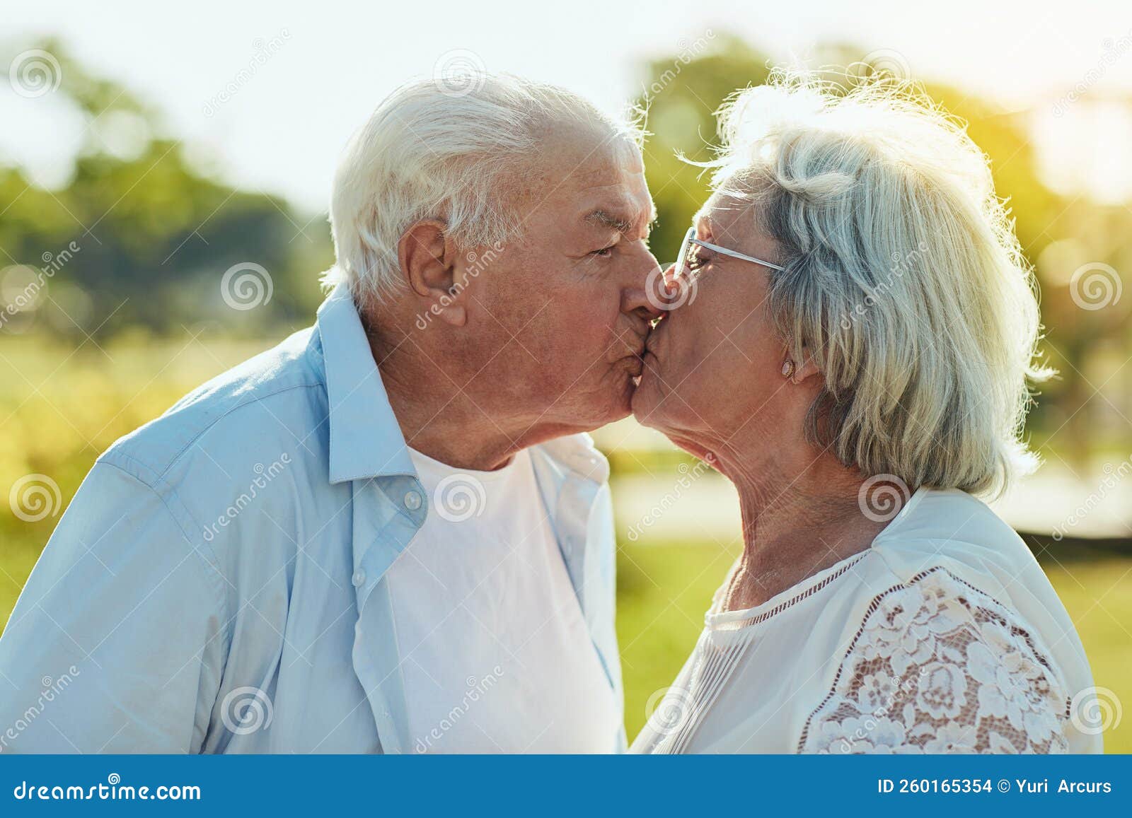 Kissing Man Older Outside Woman Stock Photos
