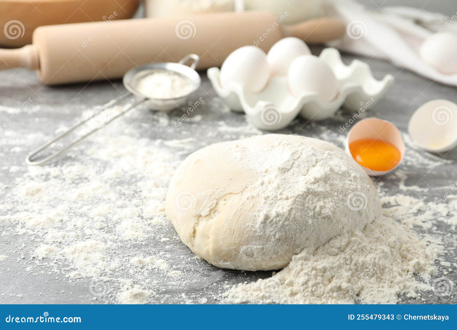 Wheat Dough and Products on Grey Table. Cooking Pastries Stock Image