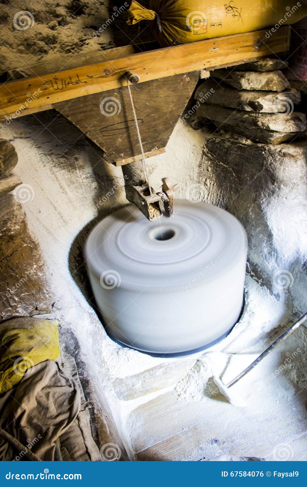 The Wheat Grinder of the Stone Stock Photo Image of culture, grainder