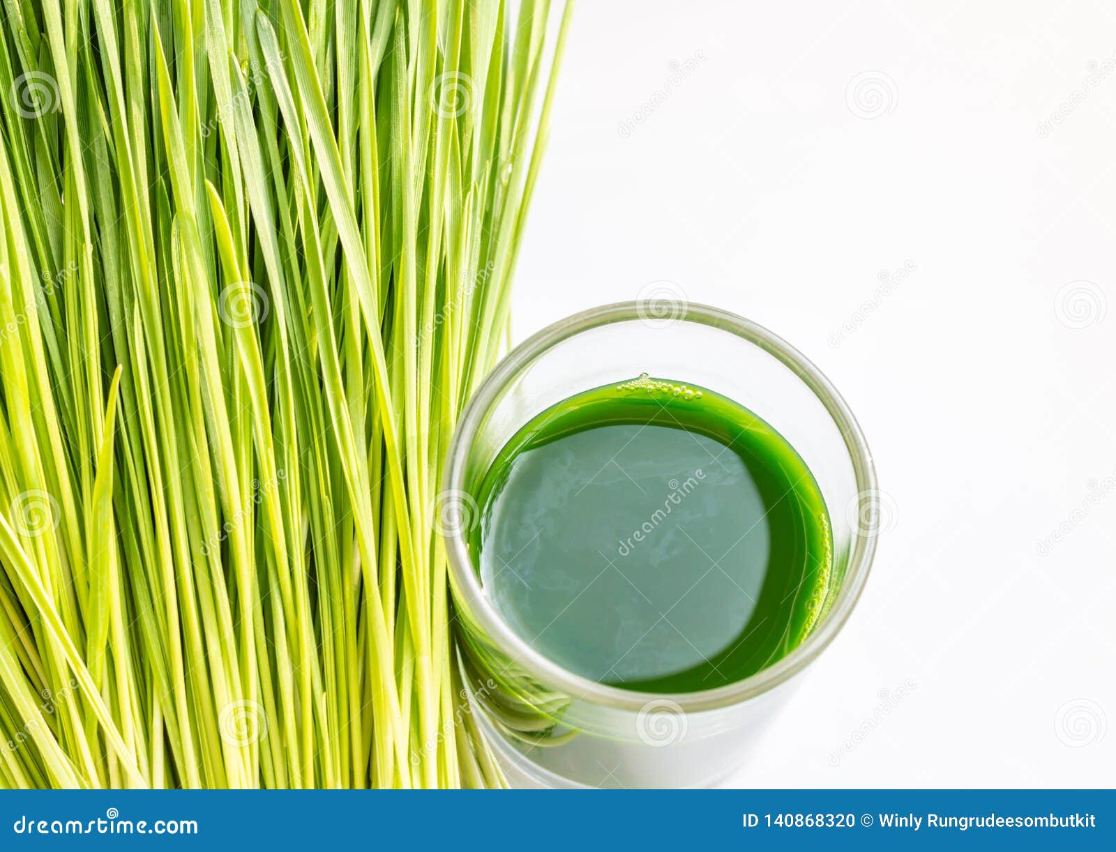 Wheatgrass Juice One Shot, on White Background. Stock Photo Image of