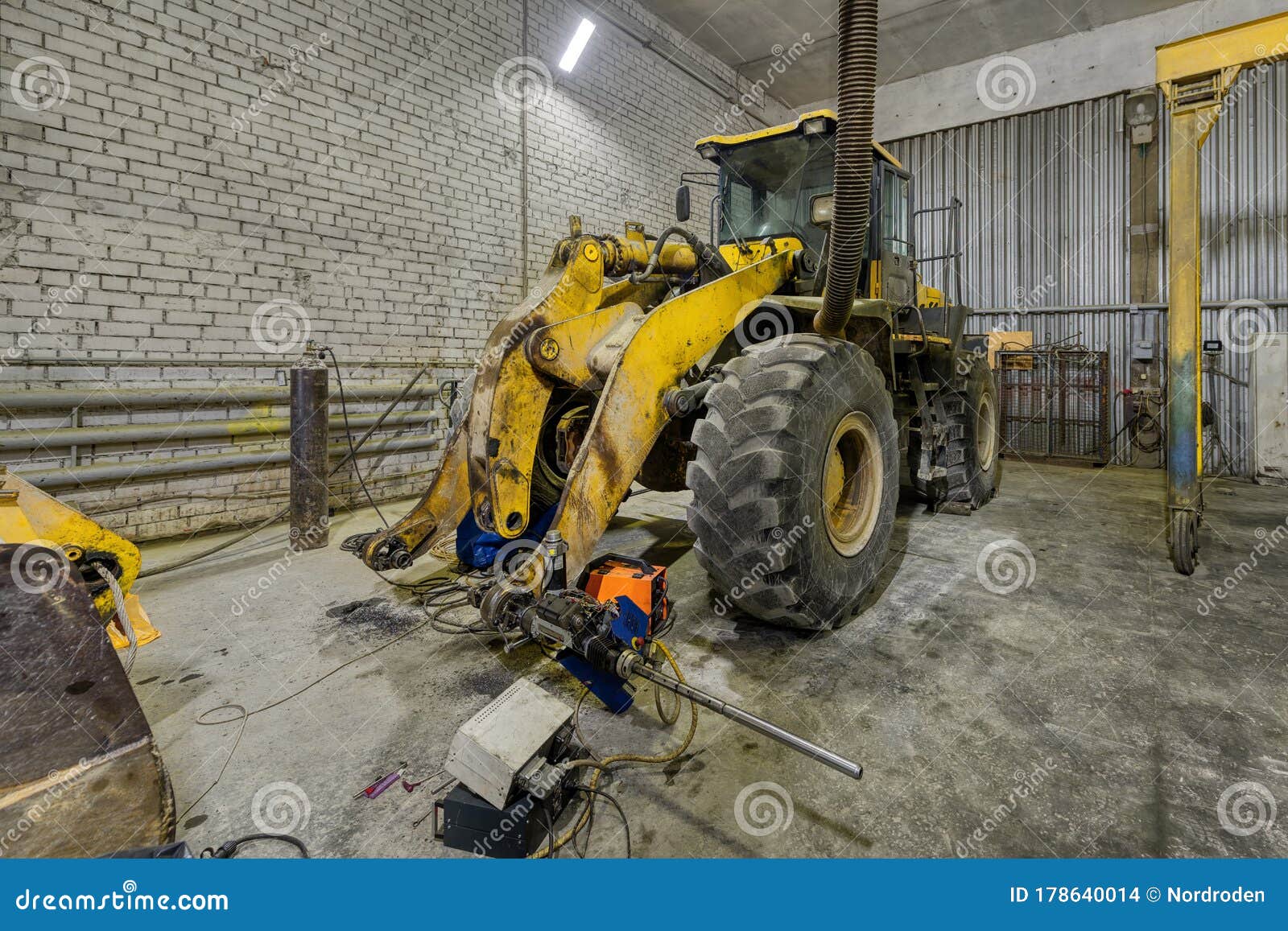 Wheel Loader in a Repair Station. Stock Photo Image of equipment