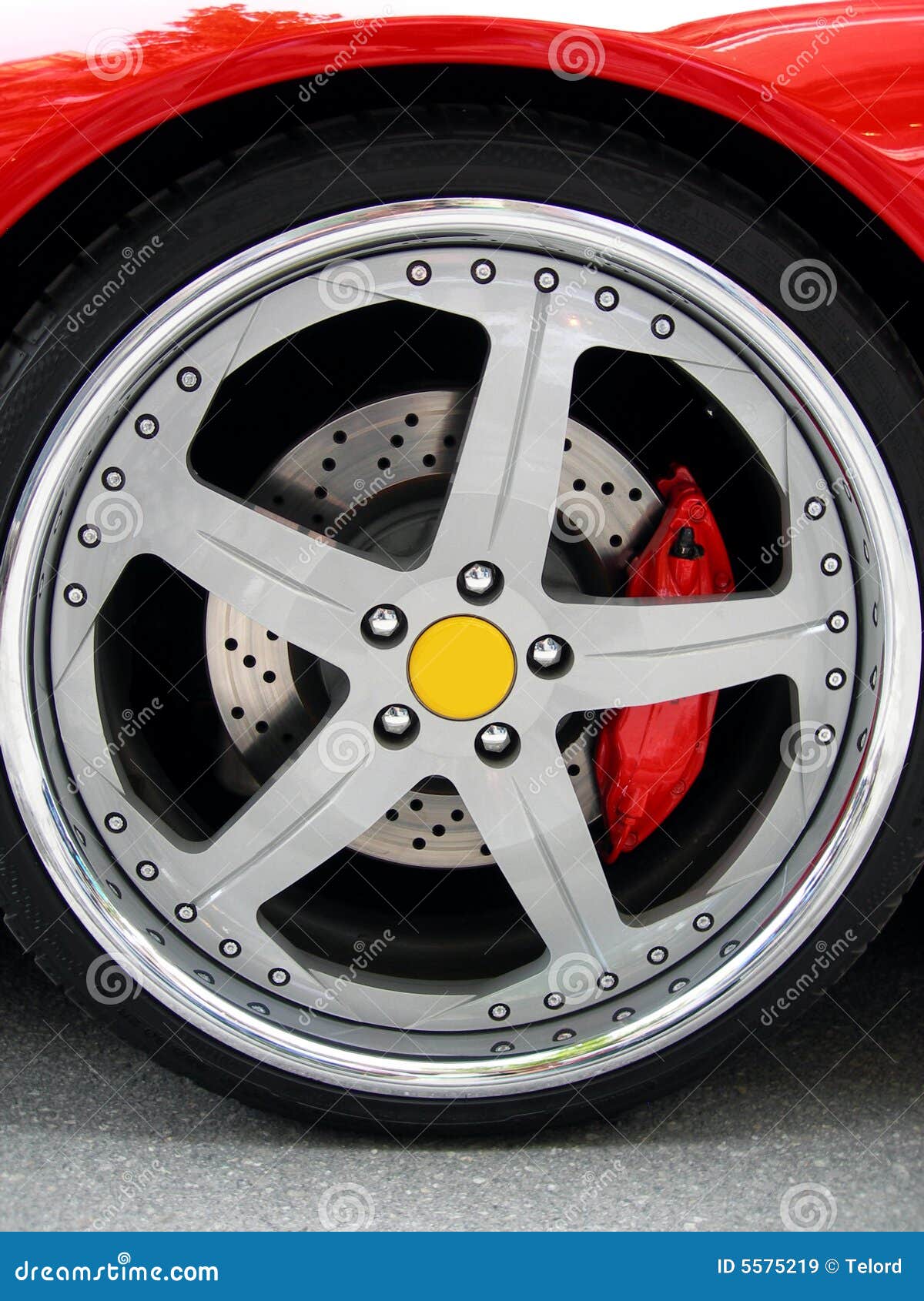 Wheel on a red sport car stock image. Image of modern 5575219