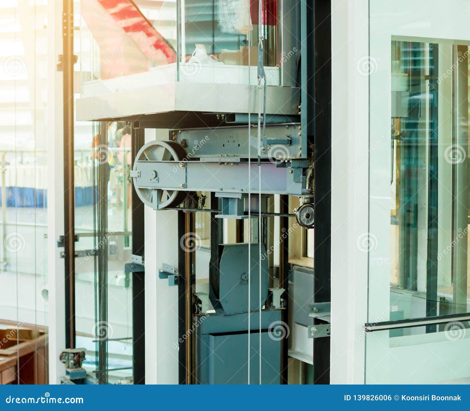 inventar travesura dar a entender Wheel Rotating with Sling Cable by Motor Driven of Passenger Lift System Stock Photo - Image of elevators, high: 139826006 inventar travesura dar a entender Wheel Rotating with Sling Cable by Motor Driven of Passenger Lift System Stock Photo - Image of elevators, high: 139826006