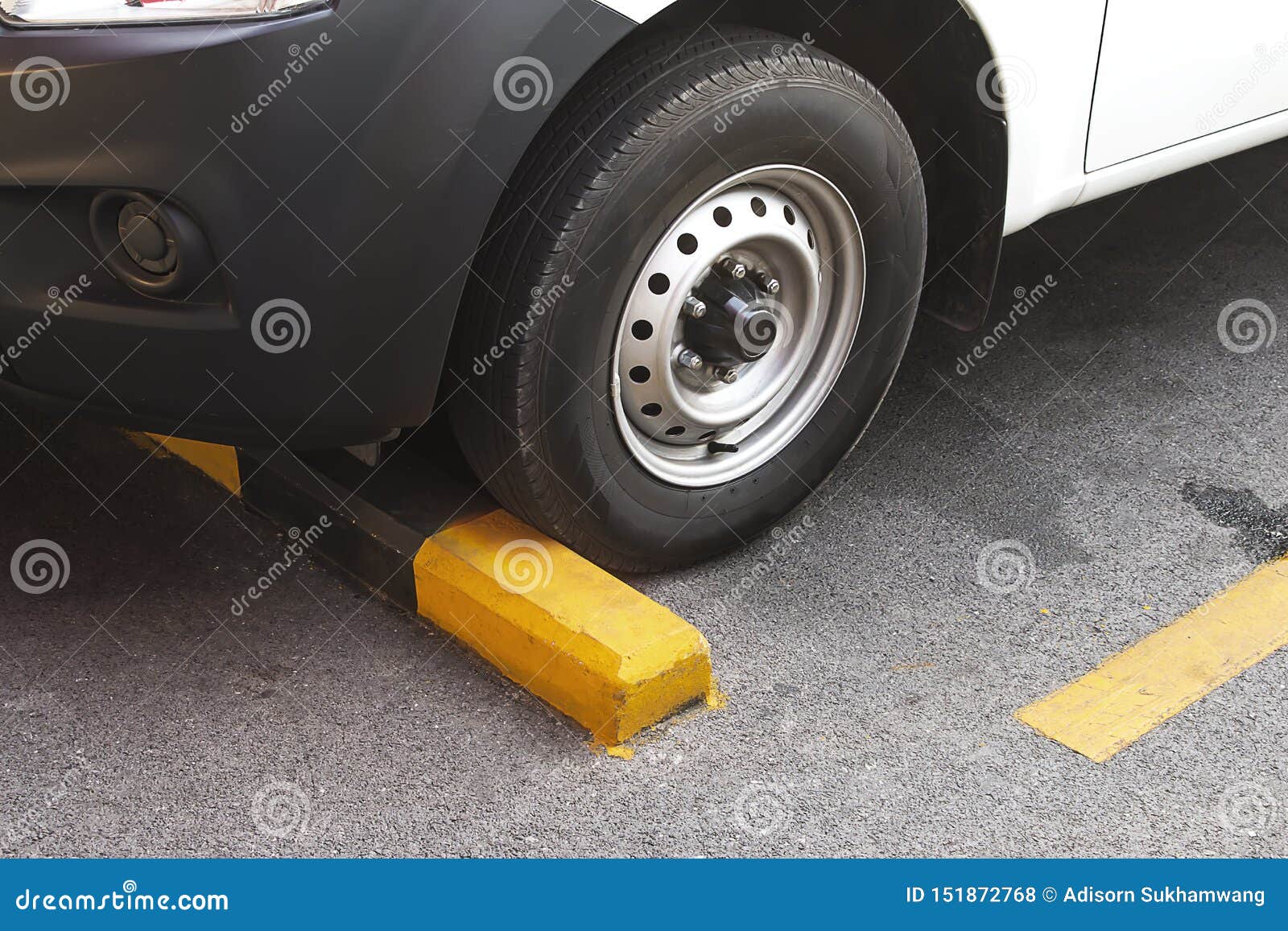 Wheel Stop Made of Concrete, Painted Yellow Black Stock Photo Image