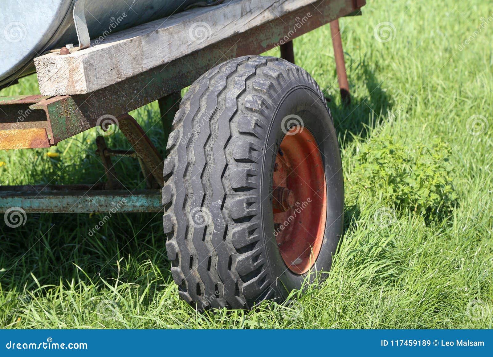 Wheel from a tractor cart stock image. Image of load 117459189
