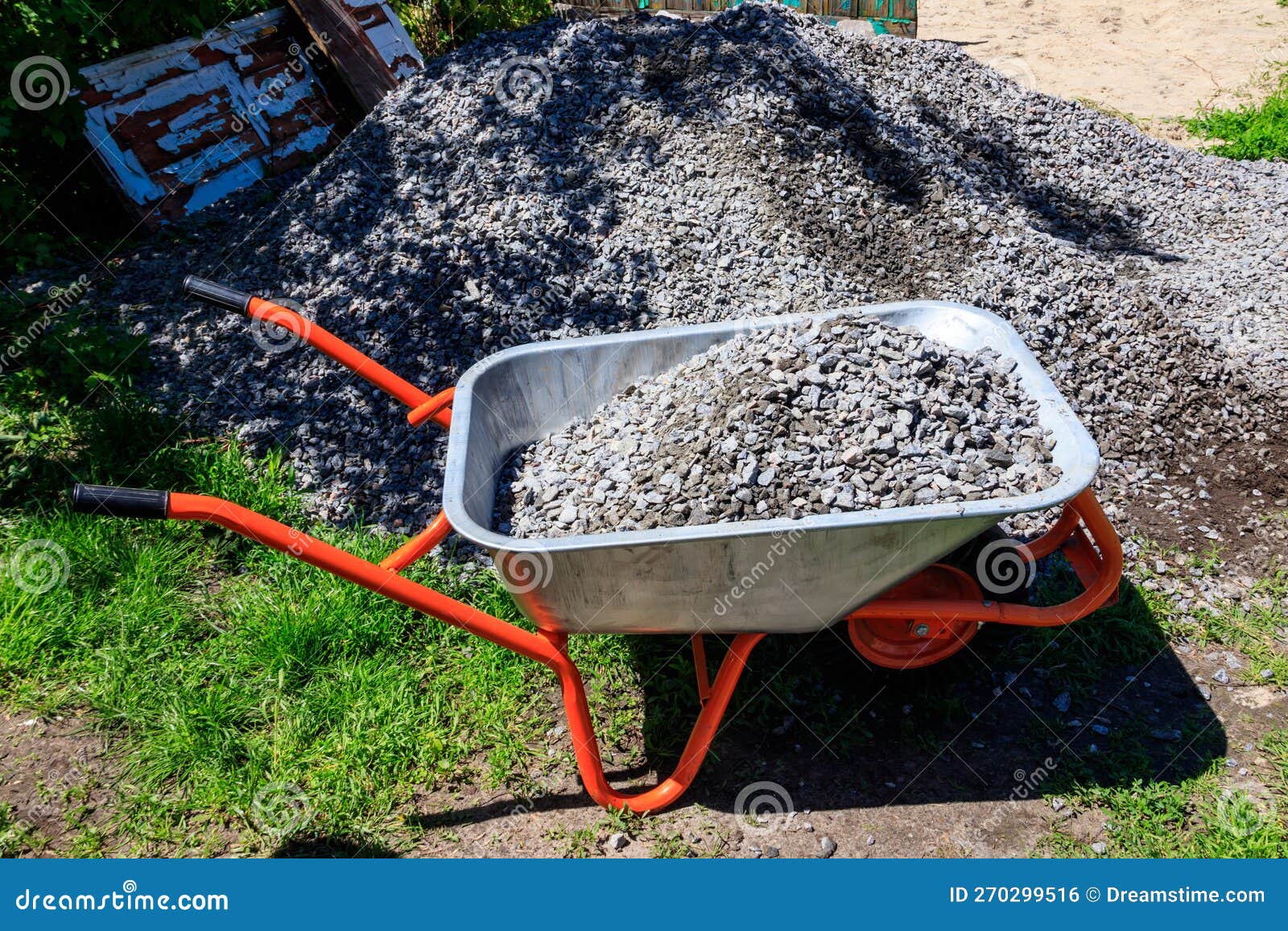 Wheelbarrow with Gravel at Construction Site Stock Photo Image of