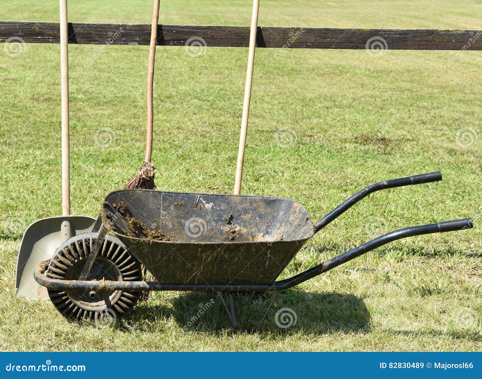 Wheelbarrow and shovel stock image. Image of shovel, backyard 82830489