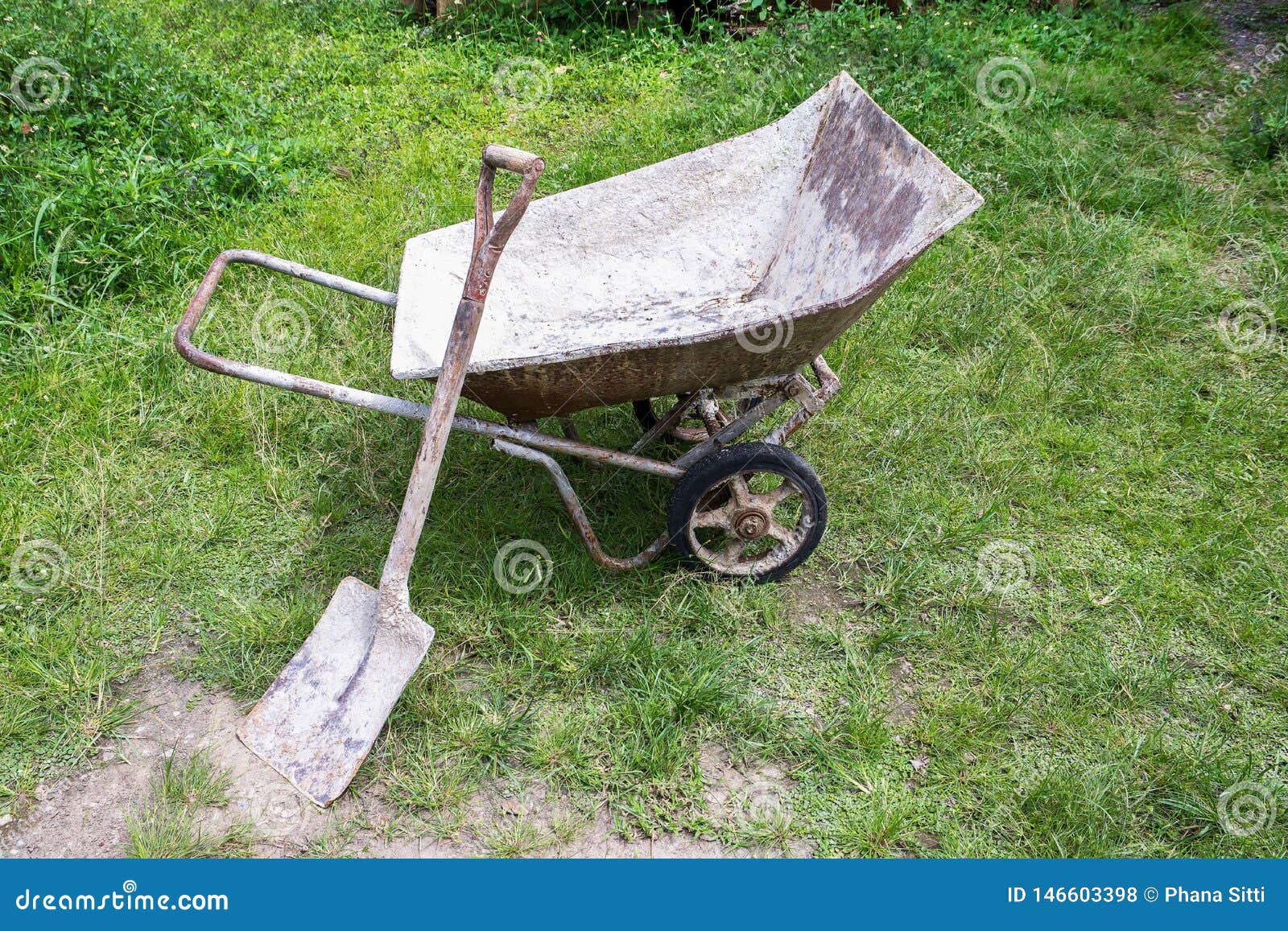 Wheelbarrow with Shovel Leaning at Lawn Stock Photo Image of nature, crop 146603398