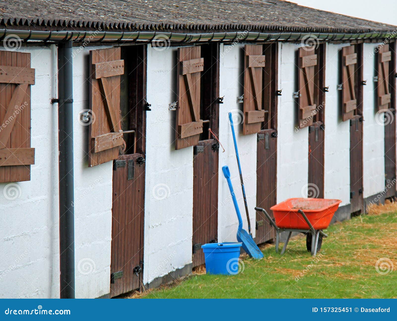 wheelbarrow and tools.