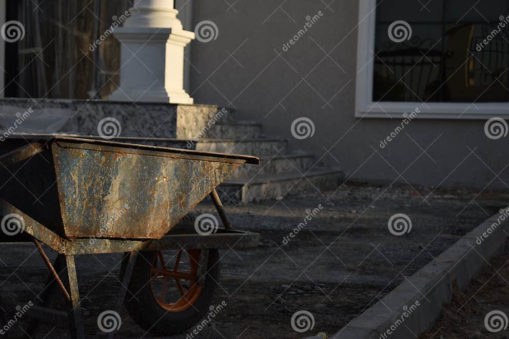 Wheelbarrow in an Under Construction Site Stock Photo Image of push