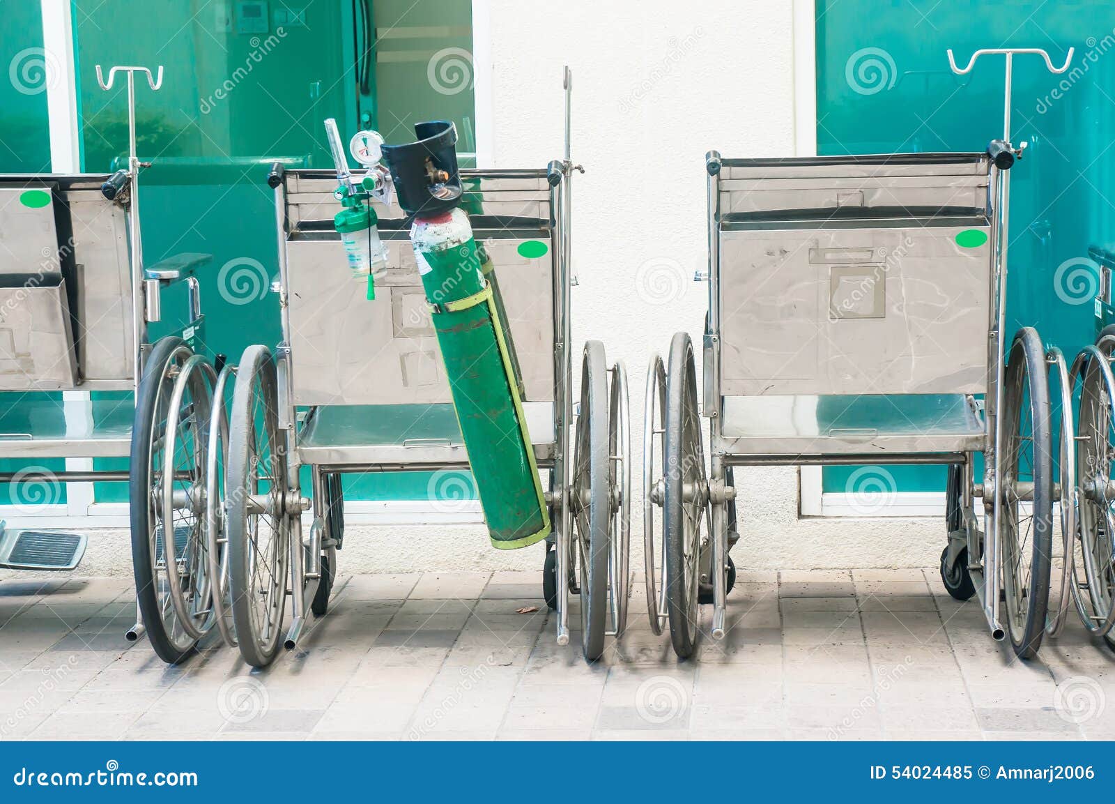 Wheelchair and oxygen tank stock image. Image of national 54024485