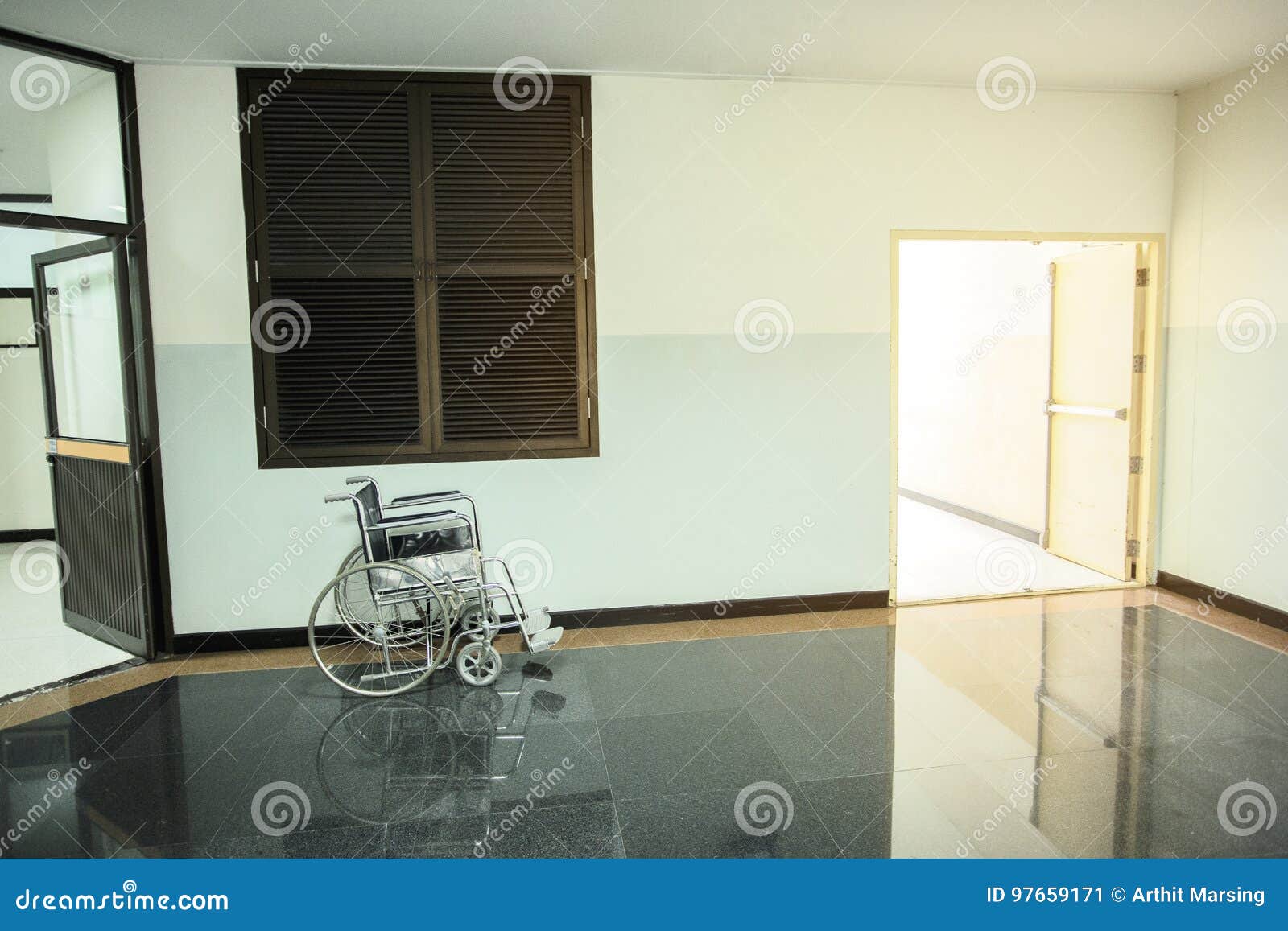 Wheelchair for Patients Stand by in the Common Hall Corridor Area Next