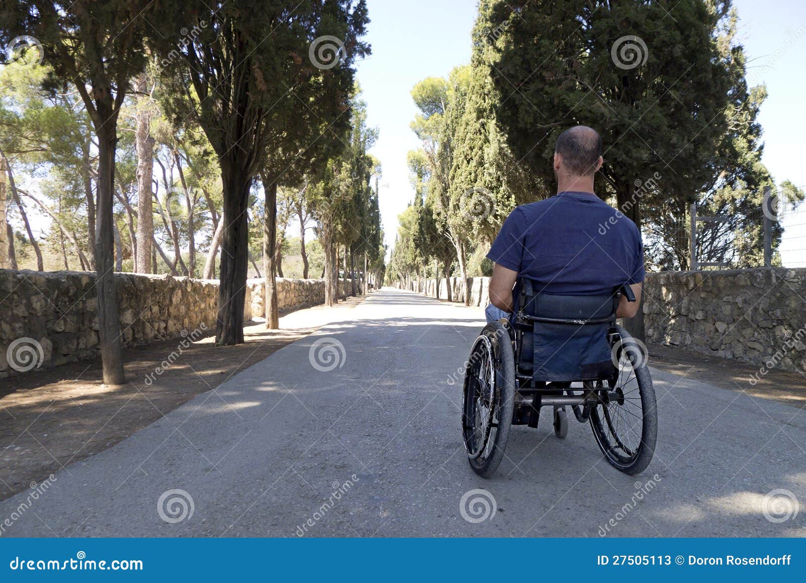 Wheelchair Road stock image. Image of devotion, disabled 27505113