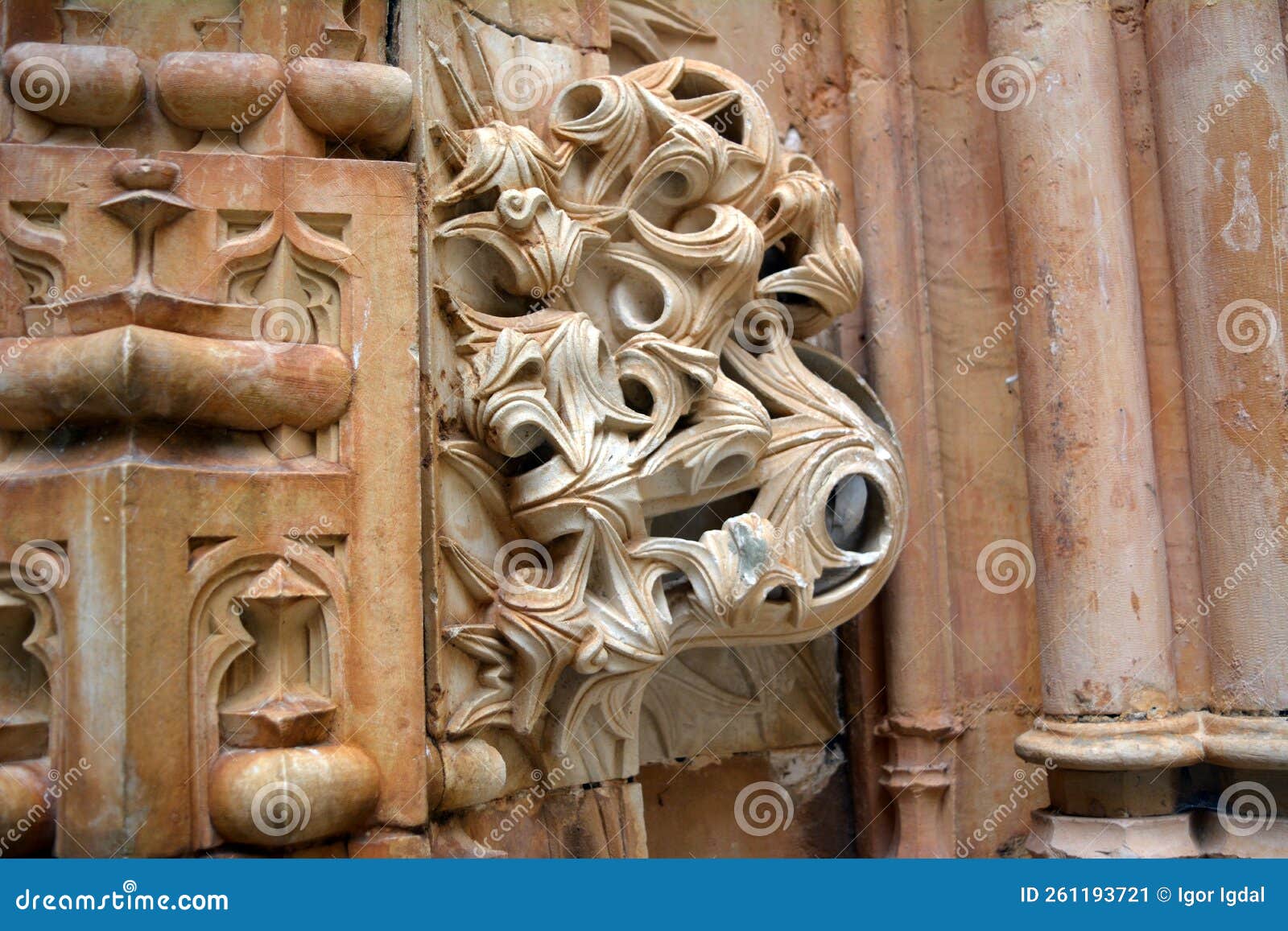 a whimsical intricate ornament in the manueline style carved in stone