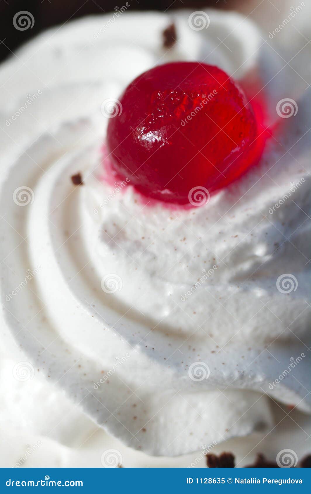 Whipped Cream on the Cake with a Cocktail Cherries Closeup Stock Image