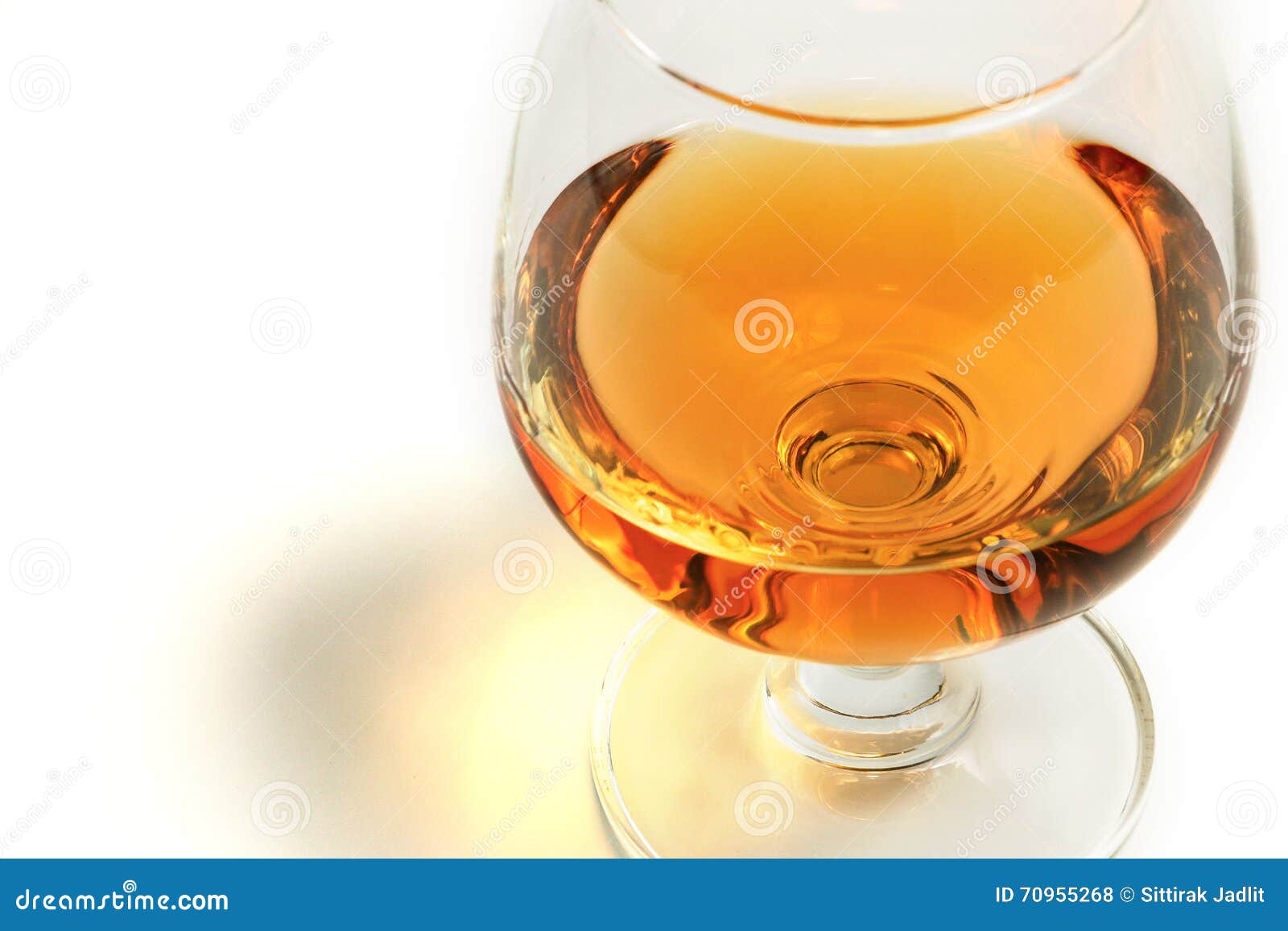 Whiskey brandy in glass stock photo. Image of yellow 70955268