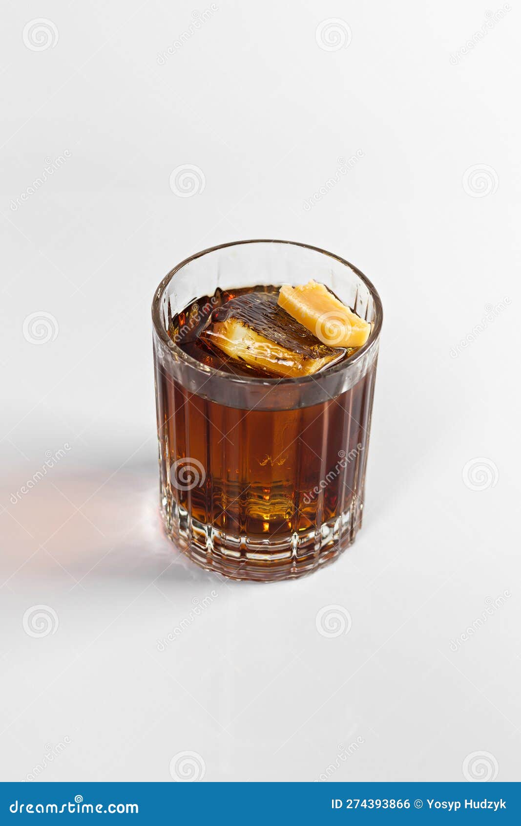 https://thumbs.dreamstime.com/z/whiskey-cola-cocktail-decorated-large-ice-cube-caramel-white-isolated-background-274393866.jpg