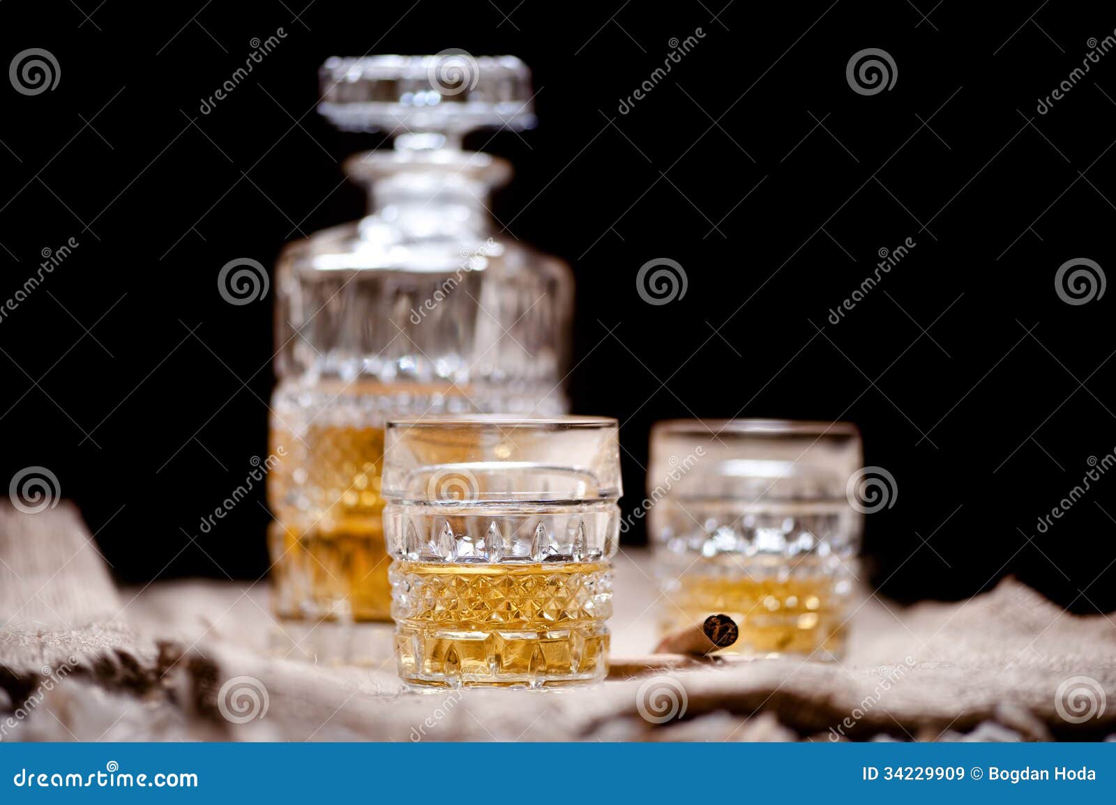 whiskey crystal bottle and glasses with alcoholic booze