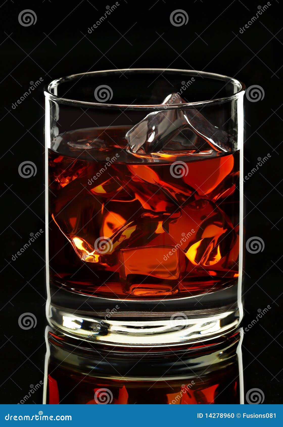 whiskey glass on black background