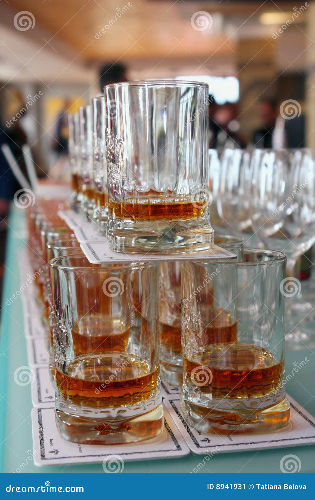 Whiskey Glasses in a row stock image. Image of mash, liquor 8941931